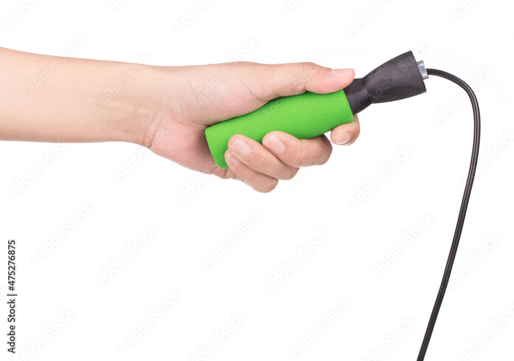 Hand holding skipping rope isolated on white background Hand holding skipping rope isolated on white background