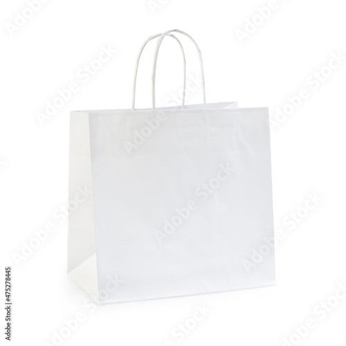 White paper shopping bag. Eco friendly biodegradable packing bag isolated on white background. Clipping path included.