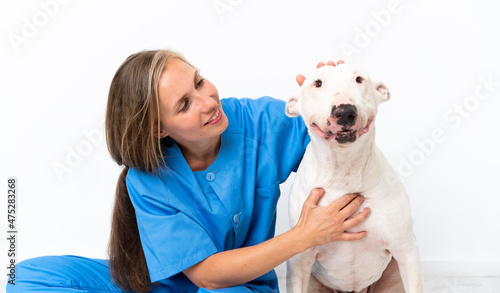 Photos Young veterinarian English woman with dog