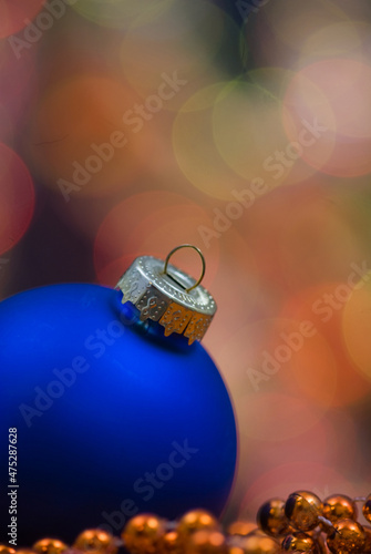 Christmas decoration, blue globe on beaded garland