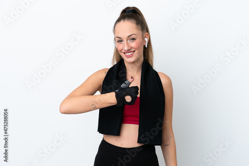 Young sport caucasian woman isolated on white background giving a thumbs up gesture