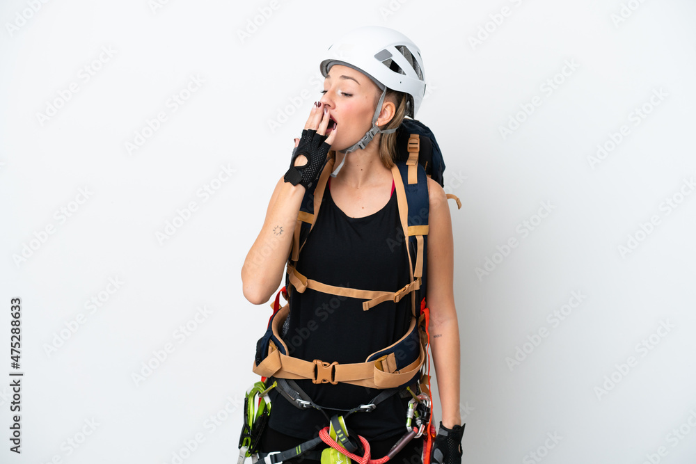 Young caucasian rock climber woman isolated on white background yawning and covering wide open mouth with hand Young caucasian rock climber woman isolated on white background yawning and covering wide open mouth with hand