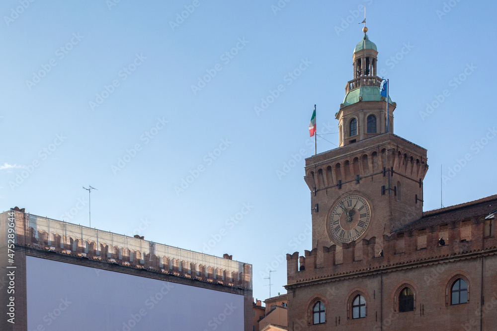The tower of Palazzo D’Accursio or Comunale, located in Piazza Maggiore, is one of the most important buildings in Bologna and the seat of the Municipality of the city. 