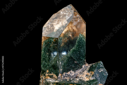 macro Axinite mineral stone on a black background photo