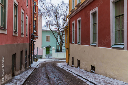 Perspective view of the unnamed alley between the Pikk Street and the Sulevimagi Street in overcast winter day, Tallinn Old Town, Estonia  © dr_verner