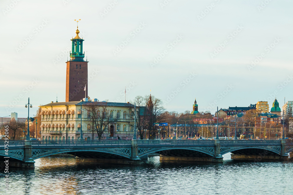 Panoramic view of Stockholm with the Vasabron Bridge, the Stromsborg Islet and the tower of the Stockholm City Hall in winter day, Sweden
