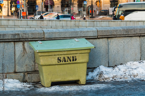A container with sand closeup on the Norrbro Bridge in sunny winter day, Stockholm, Sweden  © dr_verner