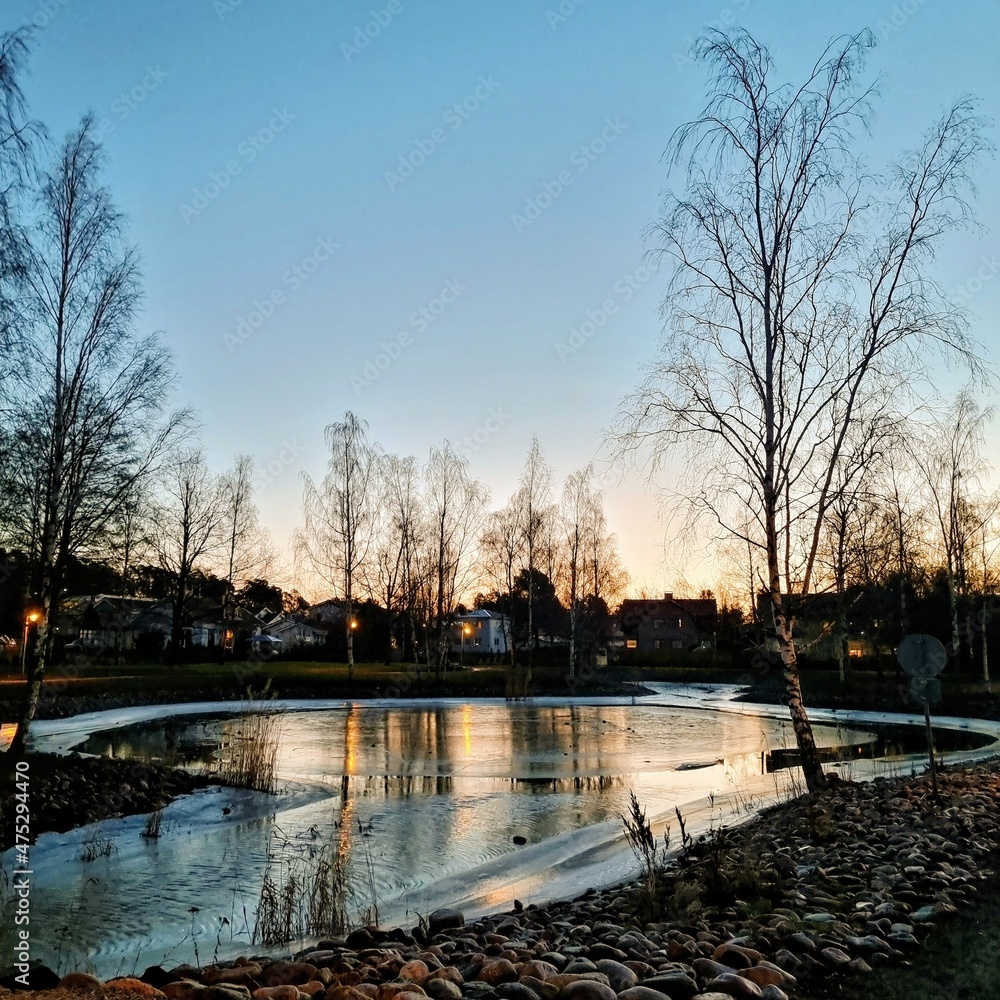 Obraz premium sunset over the river