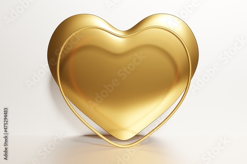 3d render of gold valentine heart with heart feame on a white background photo