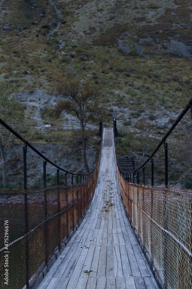 Fototapeta premium wooden bridge over the river