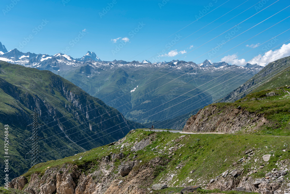 Fototapeta premium Alpine landscape with Nufenen Pass road near Ulrichen