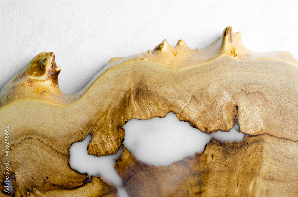 Wooden background. Wood texture. Epoxy resin is white. Burl maple.