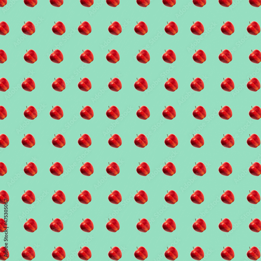Pattern of ripe red apples in green background Pattern of ripe red apples in green background
