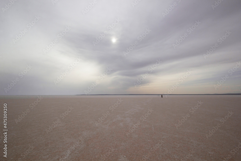 Man walking by the salt lake Man walking by the salt lake