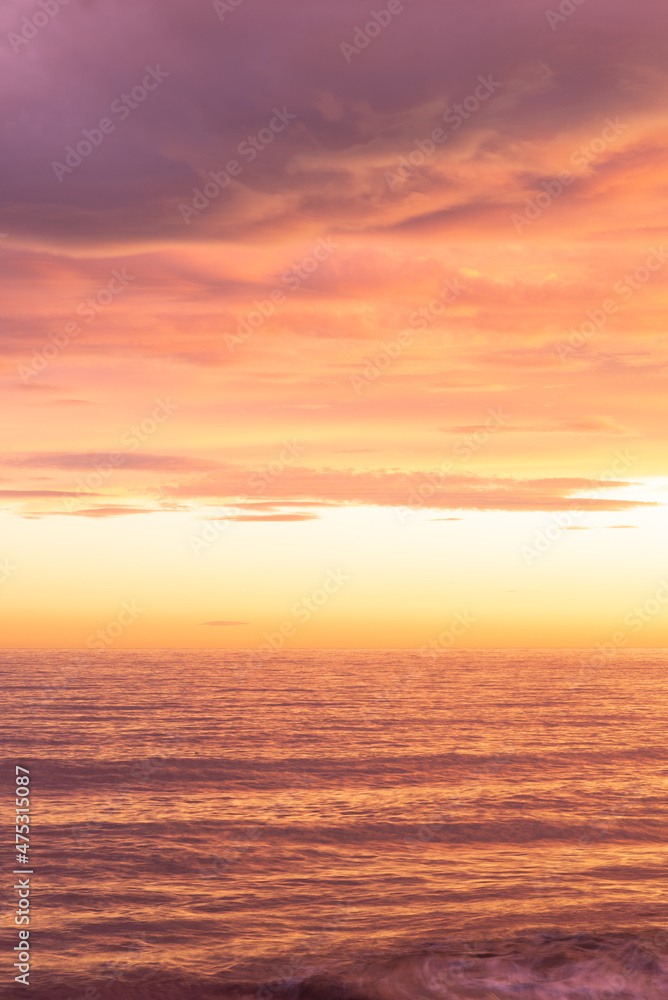 Violet and orange sunset over the sea. Violet and orange sunset over the sea.
