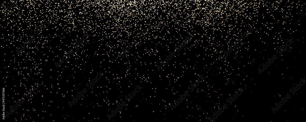 Black festive banner of golden glitter lights. Holiday backdrop, selective focus