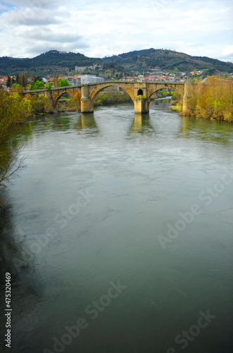 Medieval bridge Roman bridge over the river Minho Miño in Ourense Orense, Galicia, Spain 