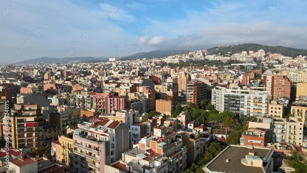 Aerial drone view of Barcelona, Spain. Blocks with multiple residential buildings, greenery Aerial drone view of Barcelona, Spain. Blocks with multiple residential buildings, greenery