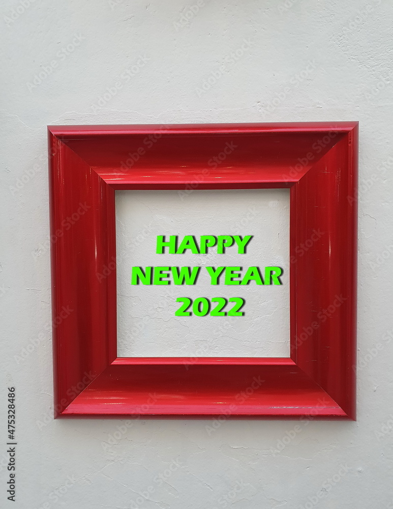 Red striped wooden square shape frame over white background with green Happy New Year 2022 lettering.
Red striped wooden square shape frame over white background with green Happy New Year 2022 lettering.