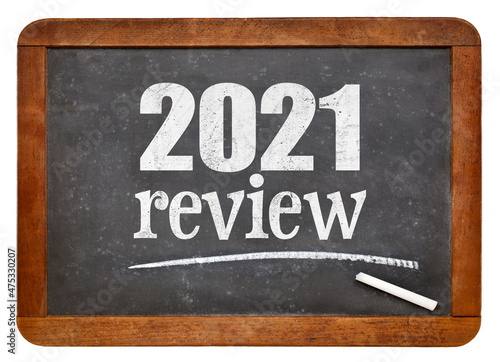 2021 review - annual review or summary of the recent year on an isolated vintage slate blackboard