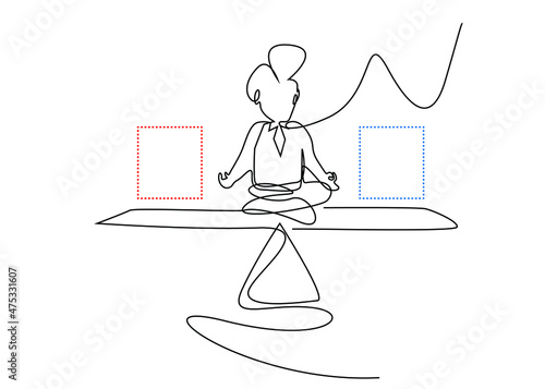 A man trying to balance work and life. A man doing yoga on a balance board.