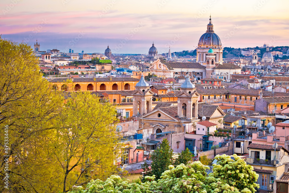Rome. Colorful dusk view of Rome rooftops and landmarks