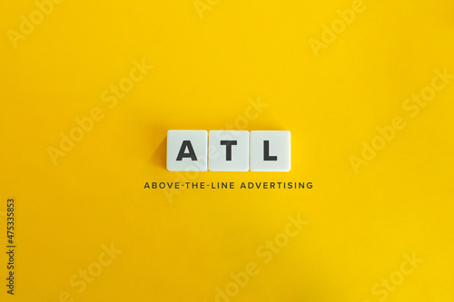Above-the-line (ATL) advertising banner. Block letters on bright orange background. Minimal aesthetics. photo