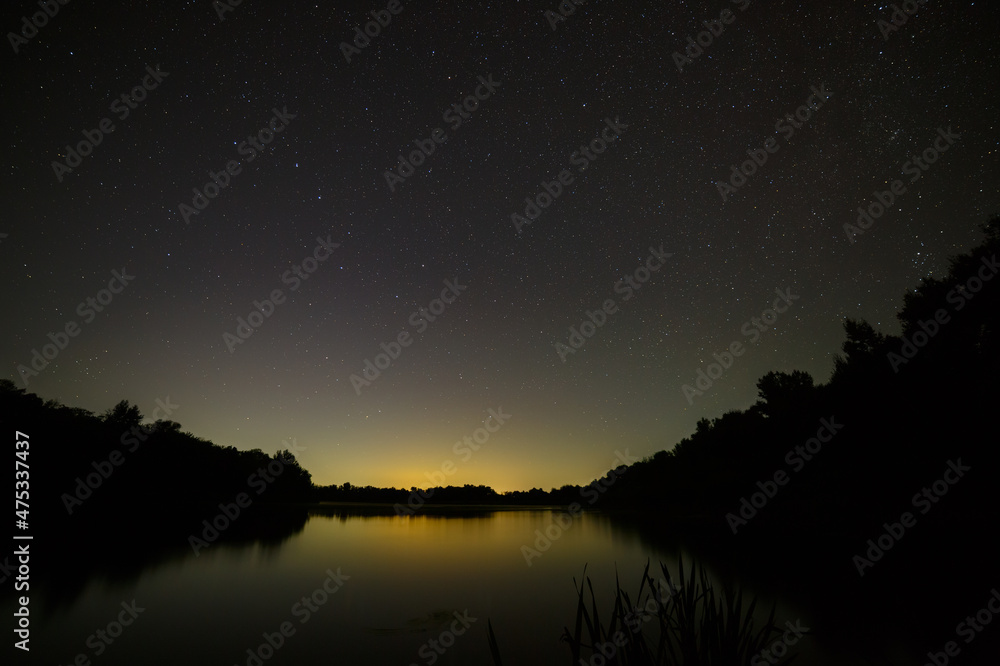 Constellation Ursa Major in the night sky over the river. A wonderful place for the landscape and travel on the journey. Constellation Ursa Major in the night sky over the river. A wonderful place for the landscape and travel on the journey.