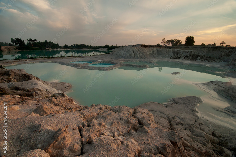 View of Kaolin Lake after sunrise. It is man-made lake, turned from a mining ground holes in Belitung Island, Indonesia.
