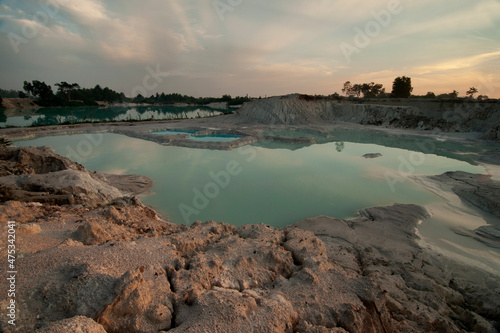 View of Kaolin Lake after sunrise. It is man-made lake, turned from a mining ground holes in Belitung Island, Indonesia.