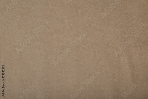 beige light brown fabric as a texture for upholstery of furniture, sofas