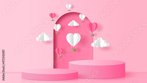 Paper cut of pink cylinder podium with heart hot air balloons and clouds for products display presentation, Valentine's Day sale concept