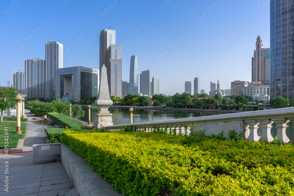 Fototapeta premium Bridge,City scenery and modern architecture skyline by the Haihe River in Tianjin, China