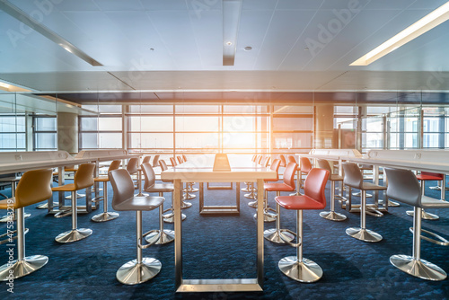 Waiting area with seats in new airport terminal photo