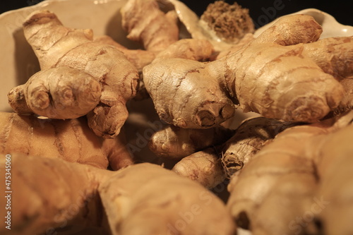 Ginger Roots on a dark background.
