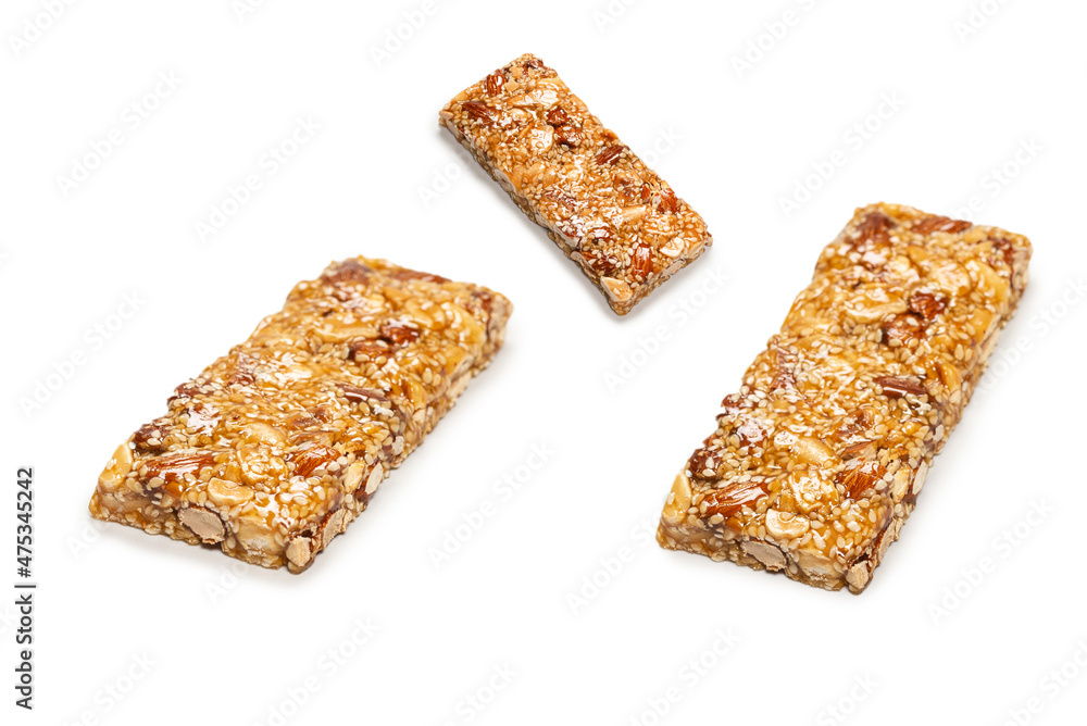 Bar with mix of nuts isolated on a white background. Bar with mix of nuts isolated on a white background.