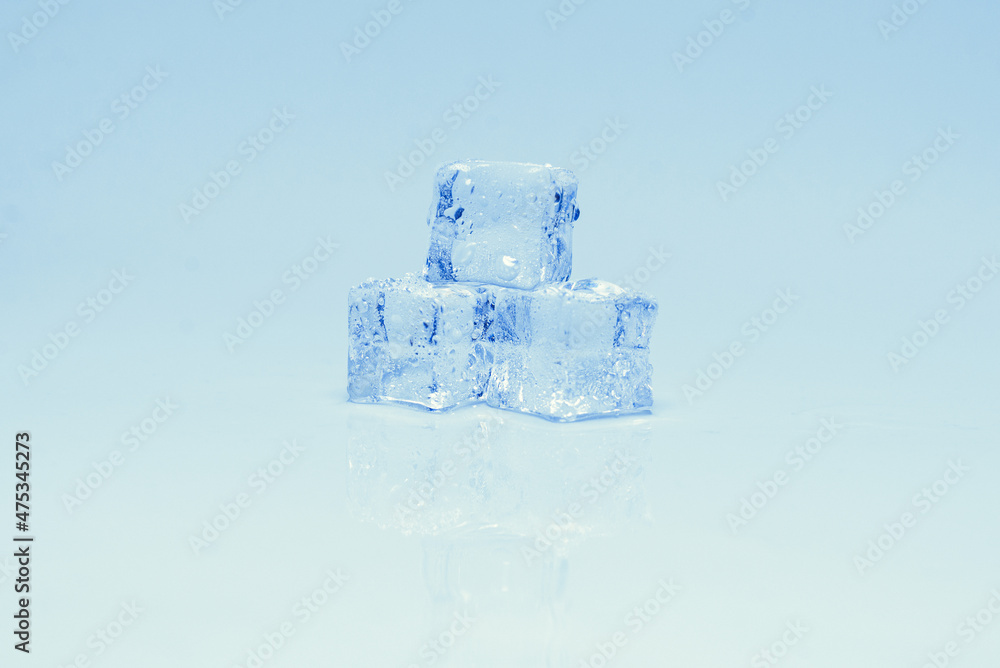 Obraz premium Ice crystal cubes, space for text or design.