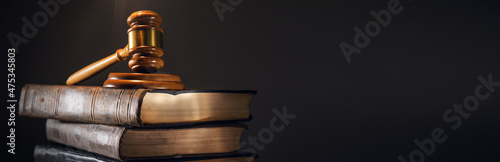 Judge gavel on legal books