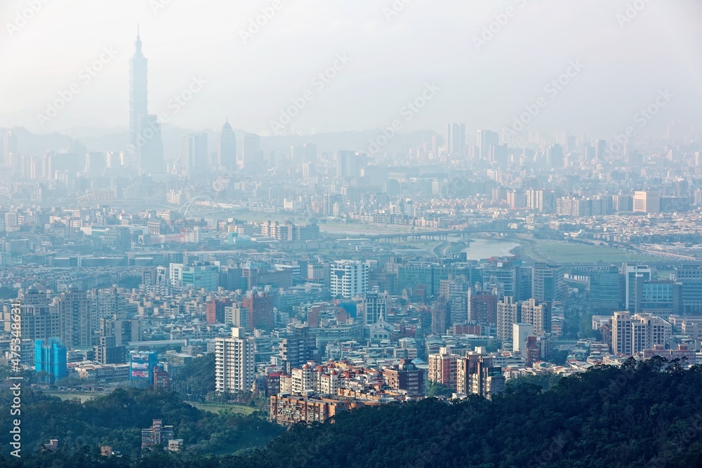 Aerial view of Taipei, capital city of Taiwan, with heavily polluted air on a hazy winter day ~  Air pollution level of PM 2.5 classified as 