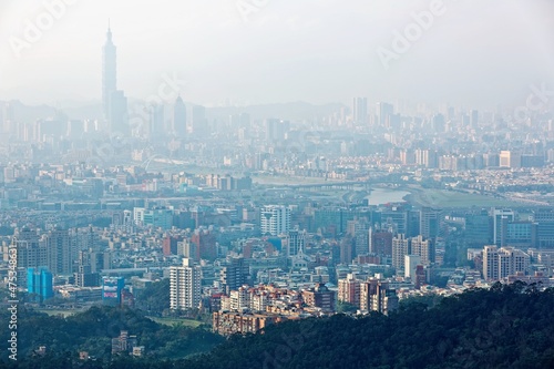 Aerial view of Taipei  capital city of Taiwan  with heavily polluted air on a hazy winter day    Air pollution level of PM 2.5 classified as  Beyond Index  