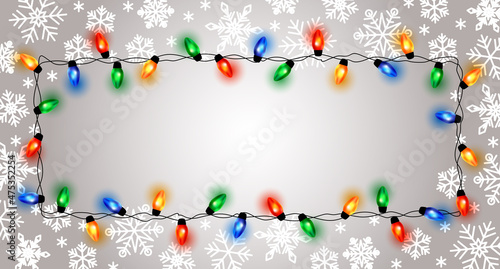 Christmas lights border and snowflakes, light string frame. Colorful Christmas frame with light bulb. Christmas lights decorative garland. Decorative garland. Xmas light border effect. Holiday decor