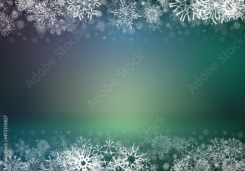 Christmas card with snowflakes falling on soft blurred background. Xmas or winter holidays greetings card with snowfall and glowing backdrop.