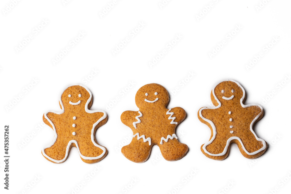 Christmas homemade gingerbread cookies, gingerbread man on the white background Christmas homemade gingerbread cookies, gingerbread man on the white background