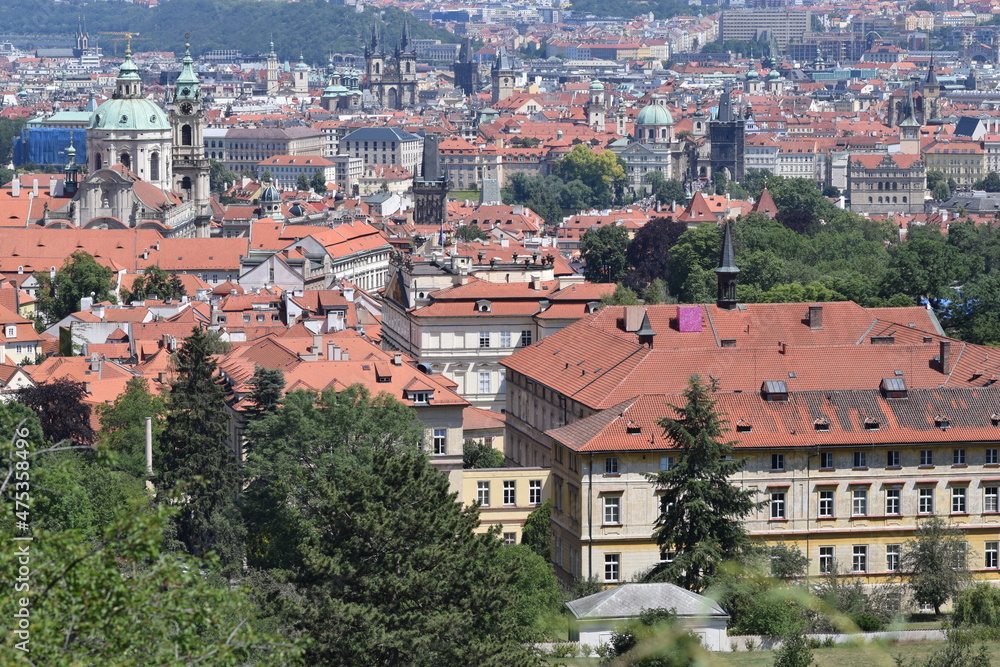Top view to red tile roofs of Prague city