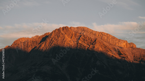 High mountains alpenglow orange color during sunset in the Pyrenees.