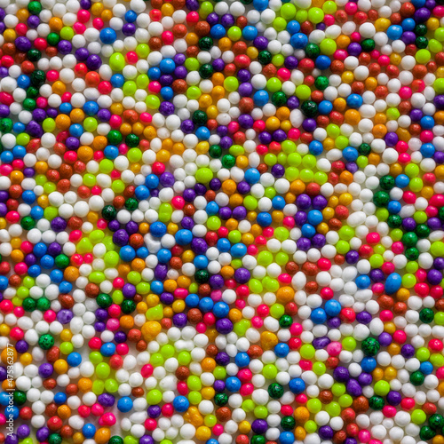 Colorful pattern background with multi-colored beads.
