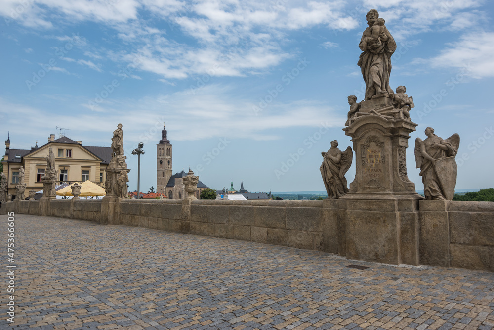Kutná Hora, Czech Republic, June 2019 - view of the famous pseudo bridge in front of the Jesuit College with it's 13 saint statues that resembles  Prague's Charles Bridge      