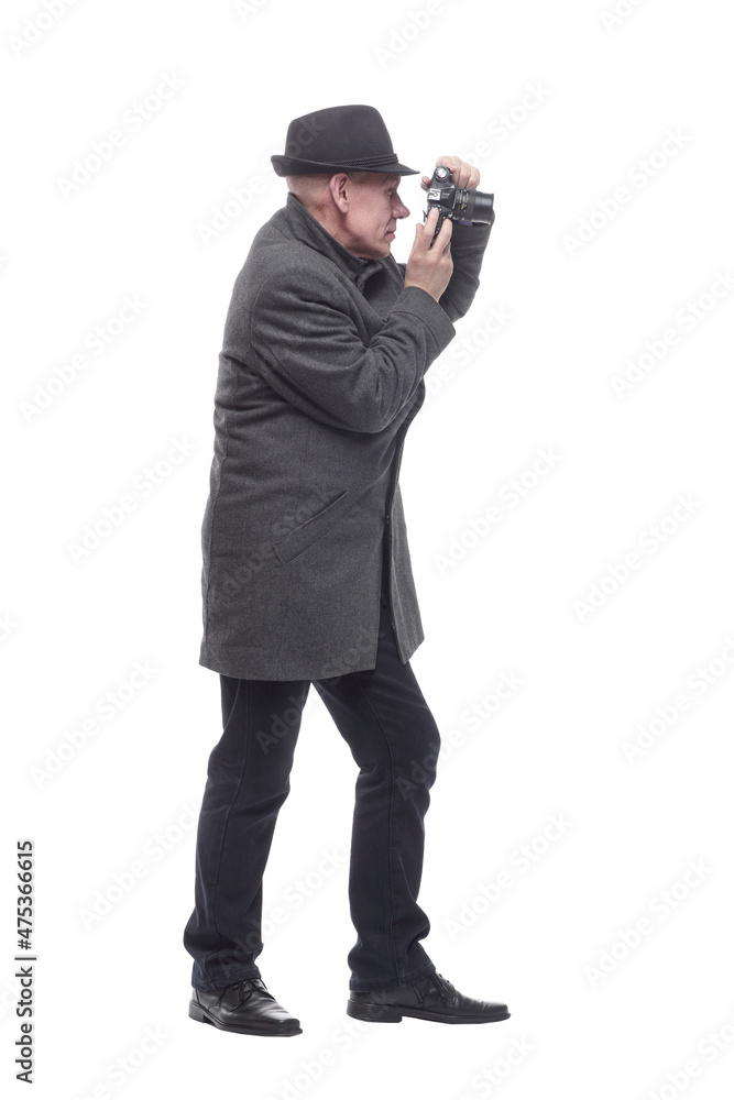 in full growth. Mature intelligent man with a camera. in full growth. Mature intelligent man with a camera.