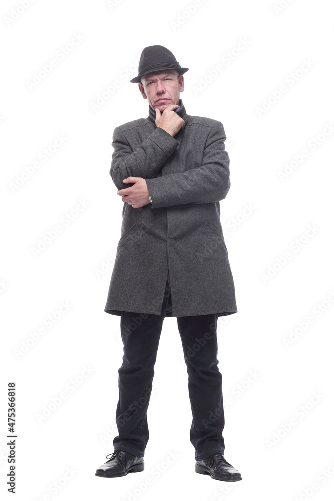 intelligent man in a hat and autumn coat. isolated on a white background. intelligent man in a hat and autumn coat. isolated on a white background.