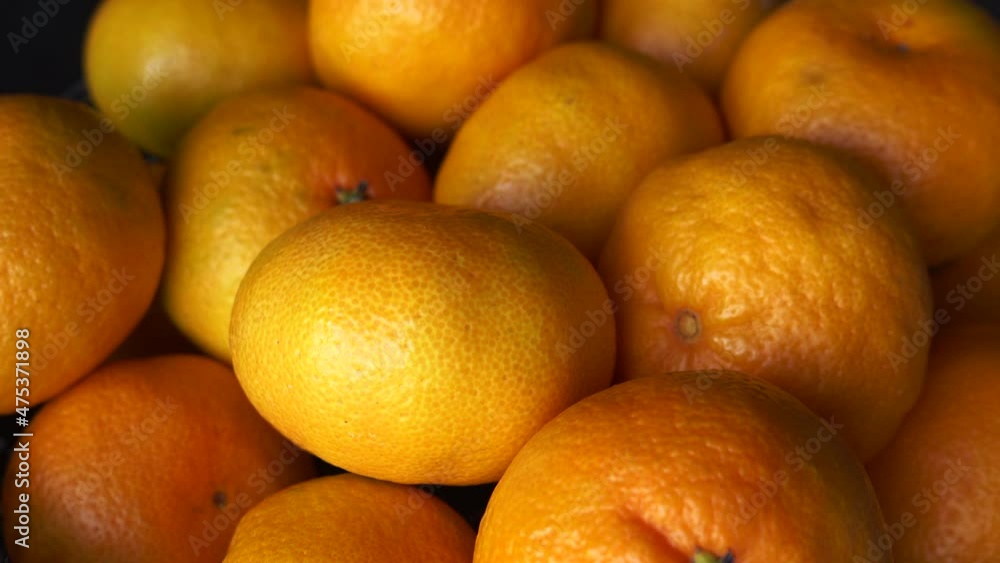 many orange tangerines close up many orange tangerines close up